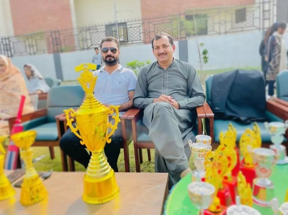 Wisdom Institute students with trophies from extracurricular activities